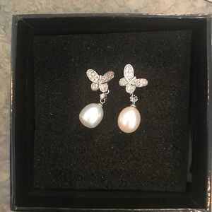 Butler and Wilson Pearl and butterfly earrings.